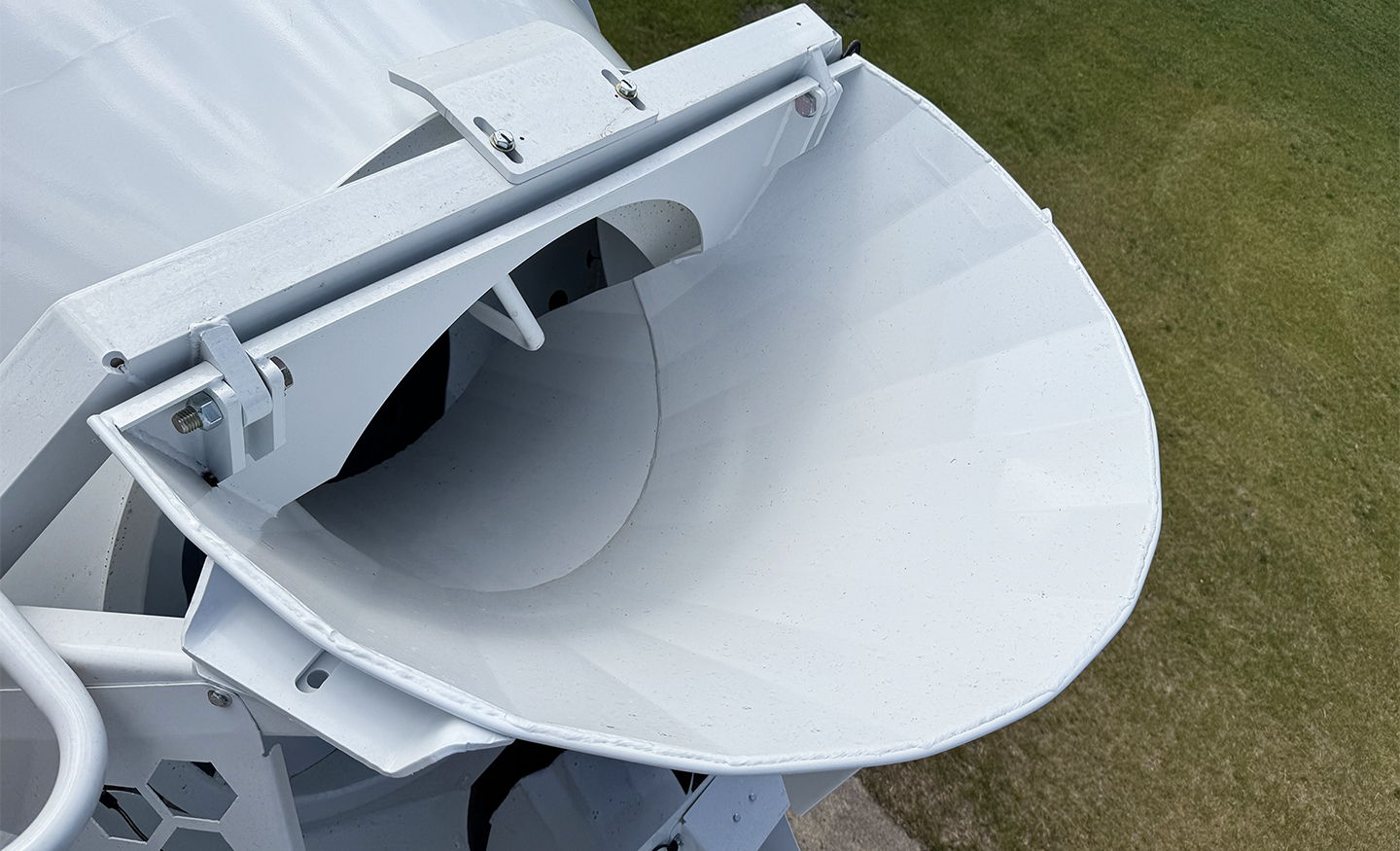The top rear of an INTEGRALdx concrete redi-mix truck, centered on the charge hopper.