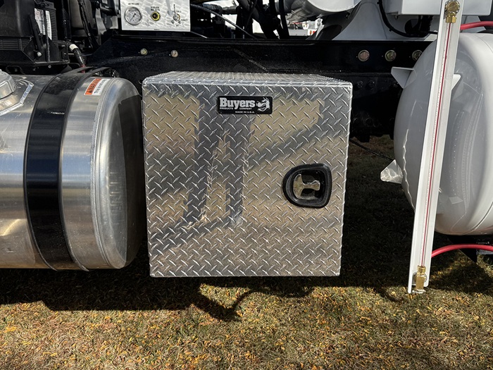 The front view of a 24 by 24 by 24 aluminum toolbox, surrounded in perforated aluminum.