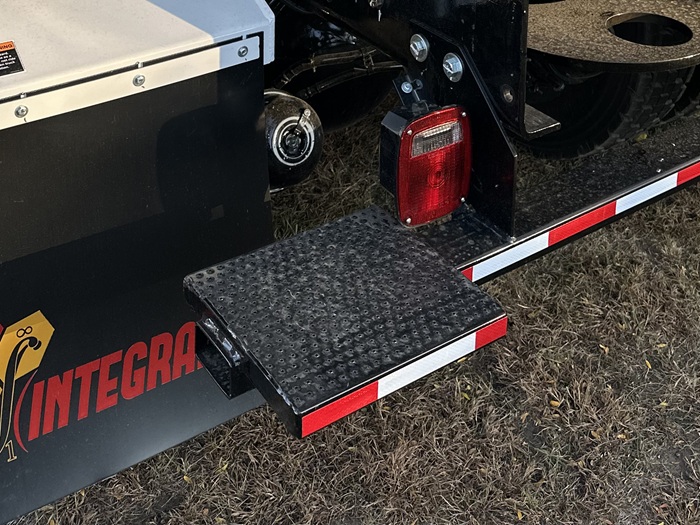 An INTEGRALdx concrete redi-mix truck equipped with rear bumper steps
