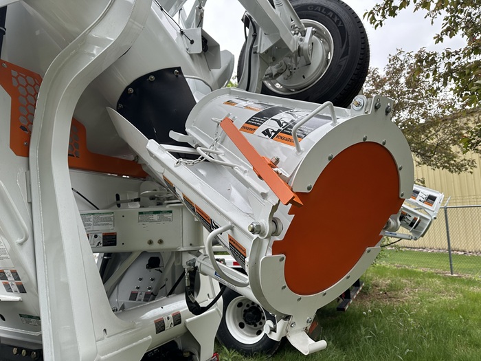 The side view of a finger saver on the chute of an INTEGRALdx concrete redi-mix truck.