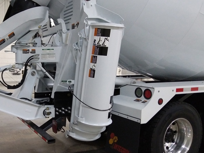 Three chutes mounted vertically on the right rear of an INTEGRALdx concrete redi-mix truck with a steel mount.