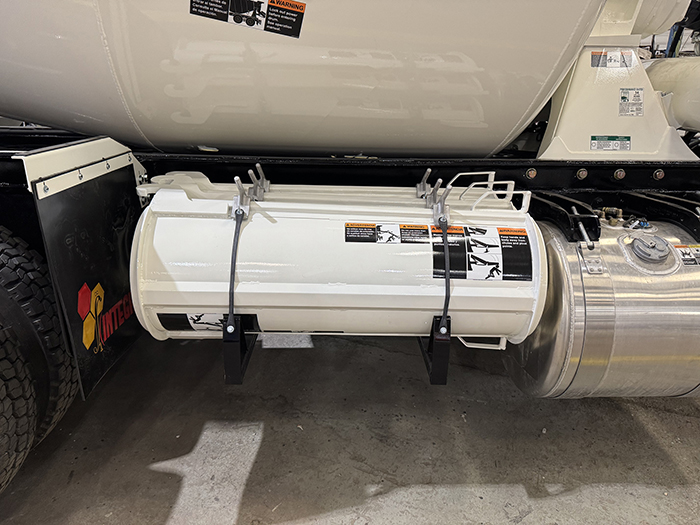 Three chutes mounted horizontally along the side of an EASI REDI-Mix Truck with an aluminum mount