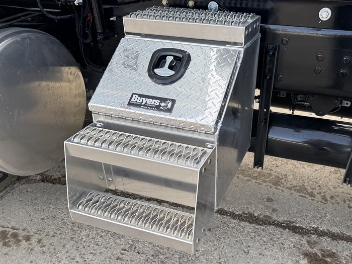 A 24 by 18 by 28 step toolbox equipped on the side of an INTEGRALdx concrete redi-mix truck.