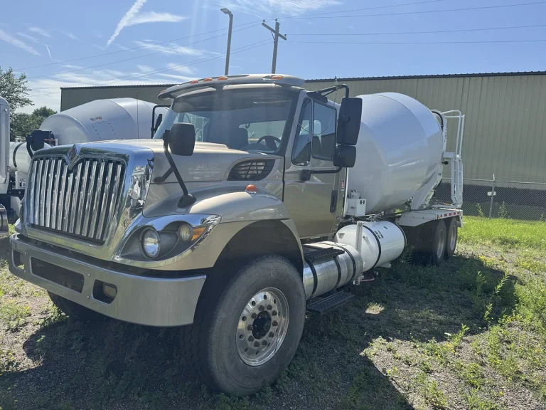 The front left view of an EASI REDI-Mix Truck.