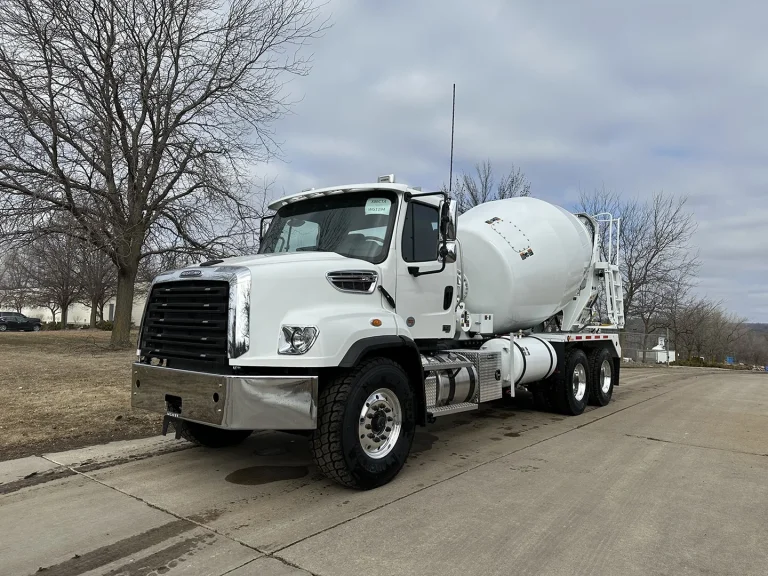 The front left view of an EASI REDI-Mix Truck.