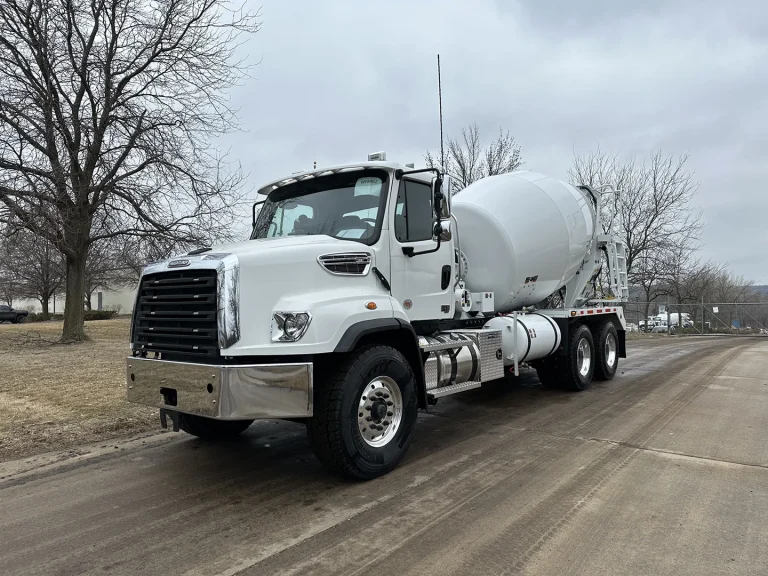 The front left view of an EASI REDI-Mix Truck.