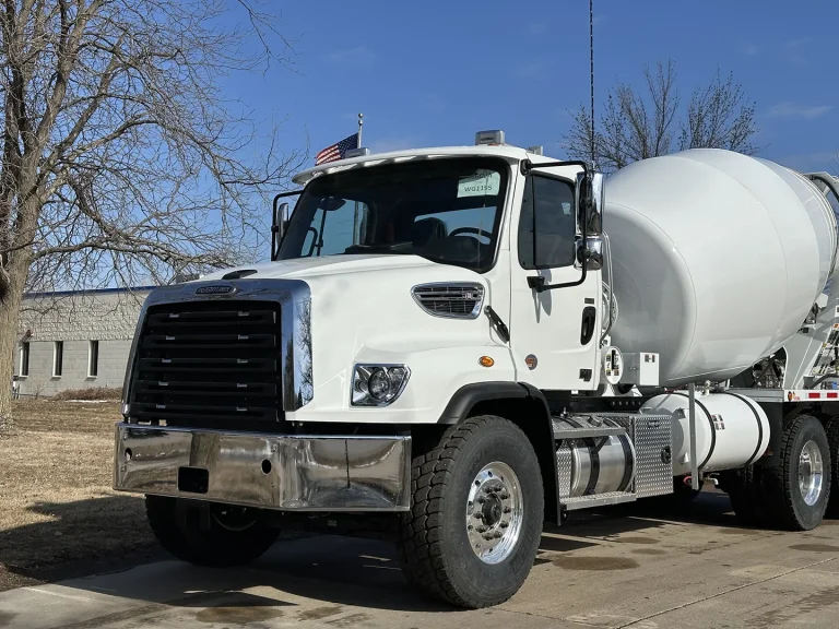 The front left view of an EASI REDI-Mix Truck.