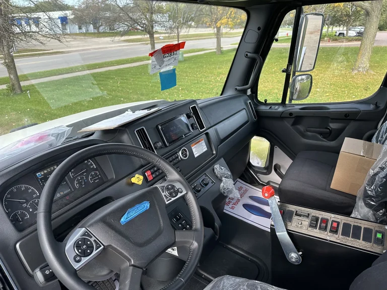 The interior cab of an EASI REDI-Mix Truck