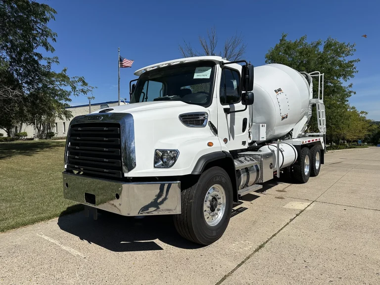 The front left view of an EASI REDI-Mix Truck