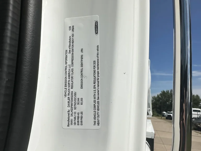 The VIN label of an EASI REDI-Mix Truck