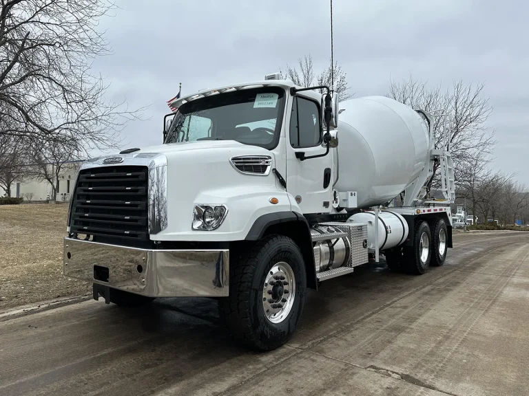 The front left view of an EASI REDI-Mix Truck.