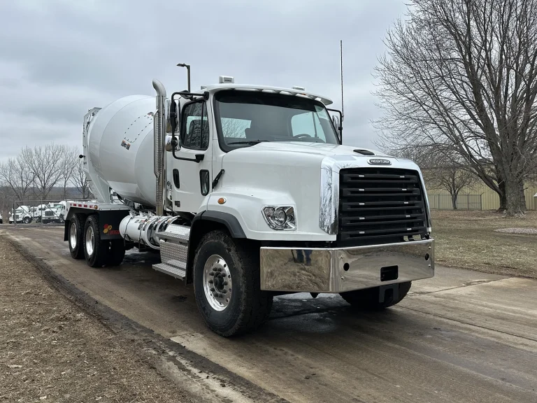 The front right side of an EASI REDI-Mix Truck.