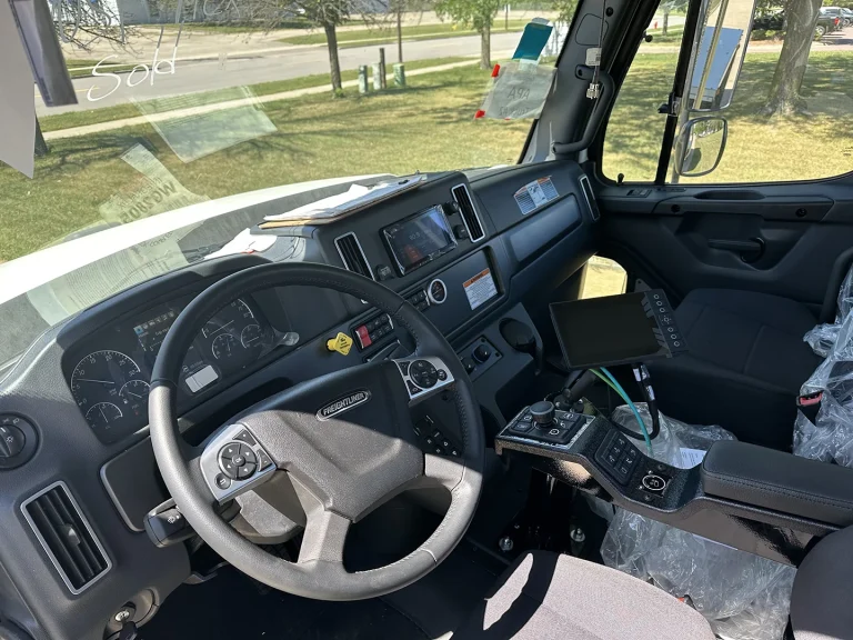The interior cab of an EASI REDI-Mix Truck