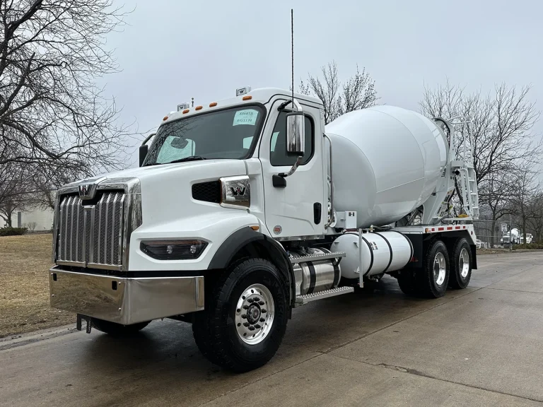 The front left view of an EASI REDI-Mix Truck.