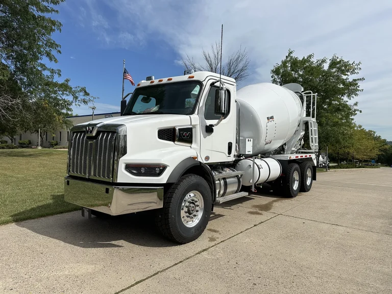 The front left view of an EASI REDI-Mix Truck.