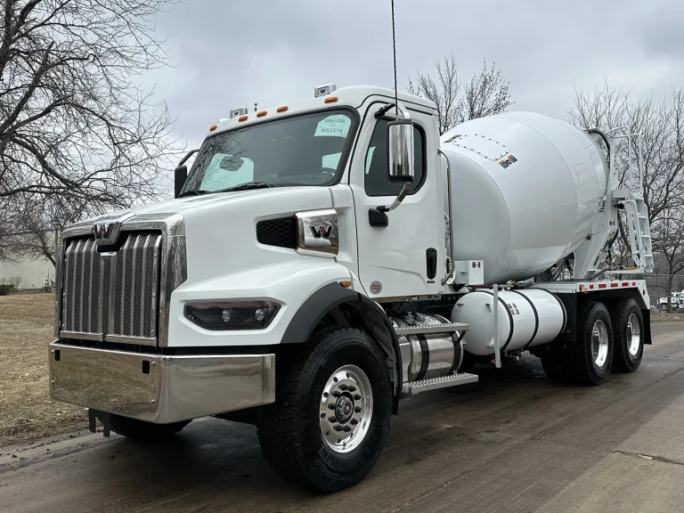 The front left view of an EASI REDI-Mix Truck.