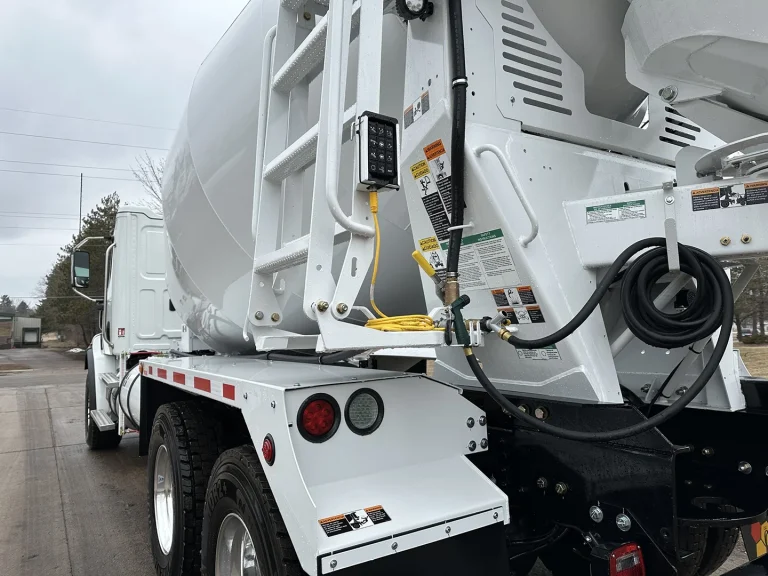 The rear left side of an EASI REDI-Mix Truck featuring pendant controls.