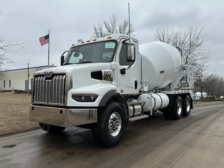 The front left view of an EASI REDI-Mix Truck.
