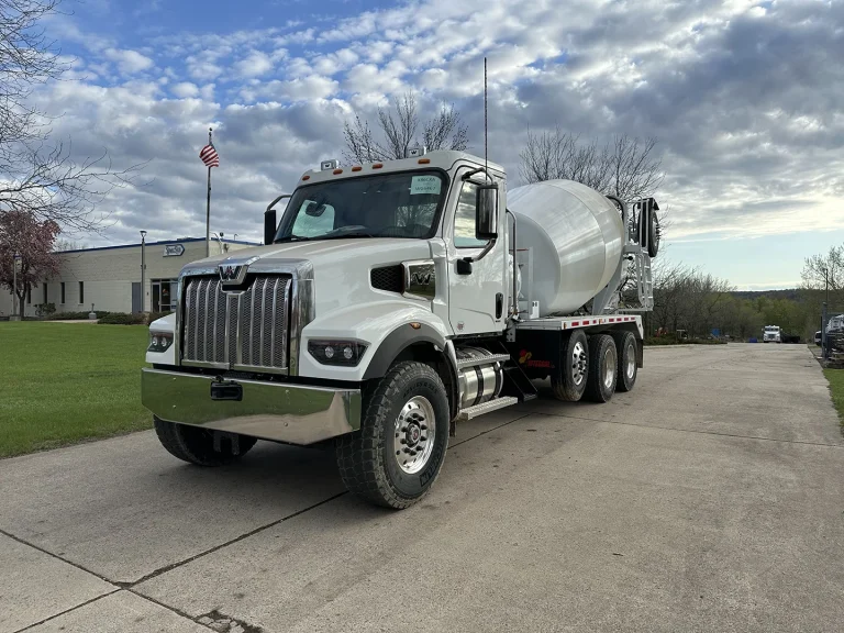 The front left view of an EASI REDI-Mix Truck